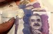 Billetes colombianos de 50.000 pesos y 20.000 pesos