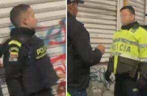 Captan en flagrancia a dos policías extorsionando a un conductor en Bogotá