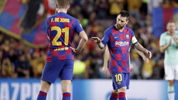 338435_Frenkie de Jong y Lionel Messi
