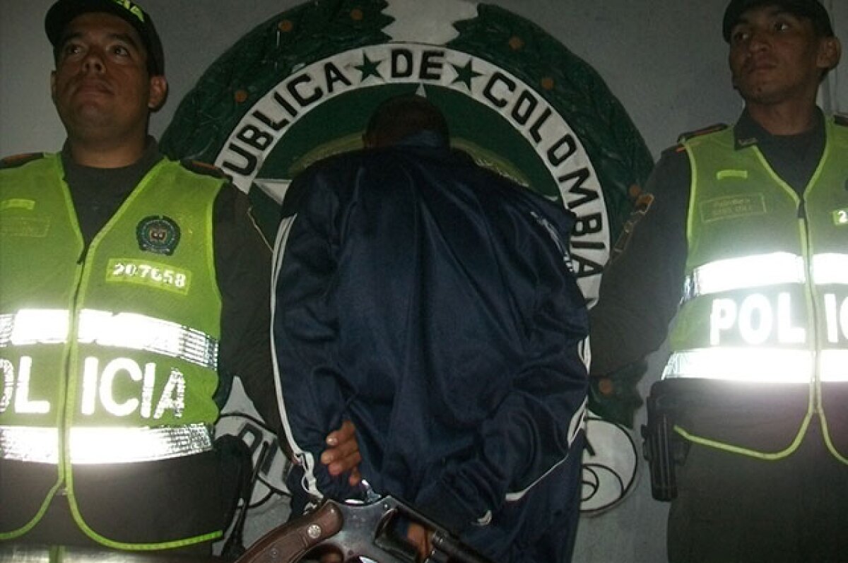 capturado-robo-local-cali-policia.jpg