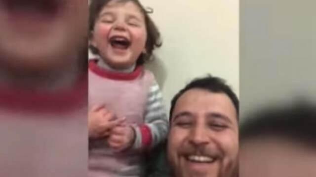El amor todo lo puede: la niña que reía con las bombas en Siria ya está a salvo de la guerra
