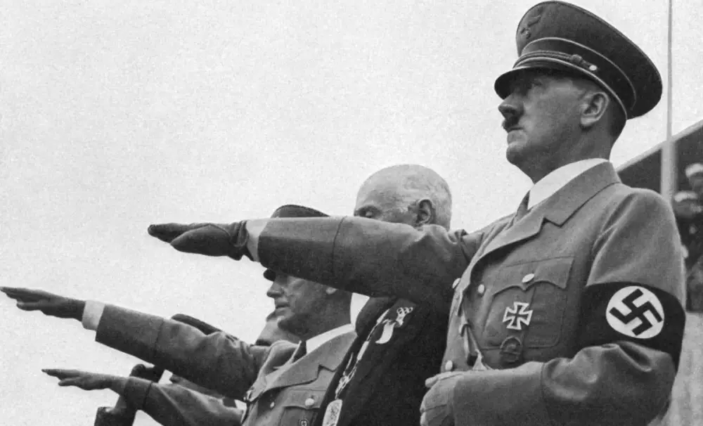 El canciller alemán Adolf Hitler da el saludo nazi durante la ceremonia de apertura de los Juegos Olímpicos de Berlín el 1 de agosto de 1936. El canciller alemán Adolf Hitler da el saludo nazi durante la ceremonia de apertura de los Juegos Olímpicos de Berlín el 1 de agosto de 1936.