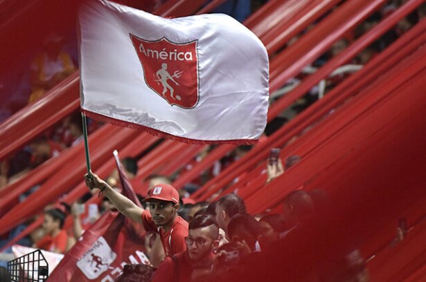 326337_hinchas_america_031219_gabriel_aponte_getty_e.jpg