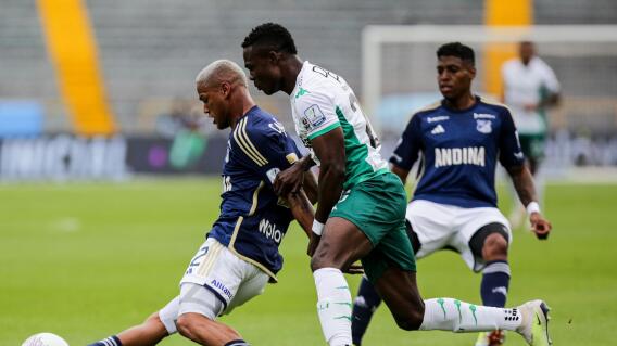 Millonarios y Cali, en acción de la Liga del fútbol colombiano. Millonarios y Cali, en acción de la Liga del fútbol colombiano.