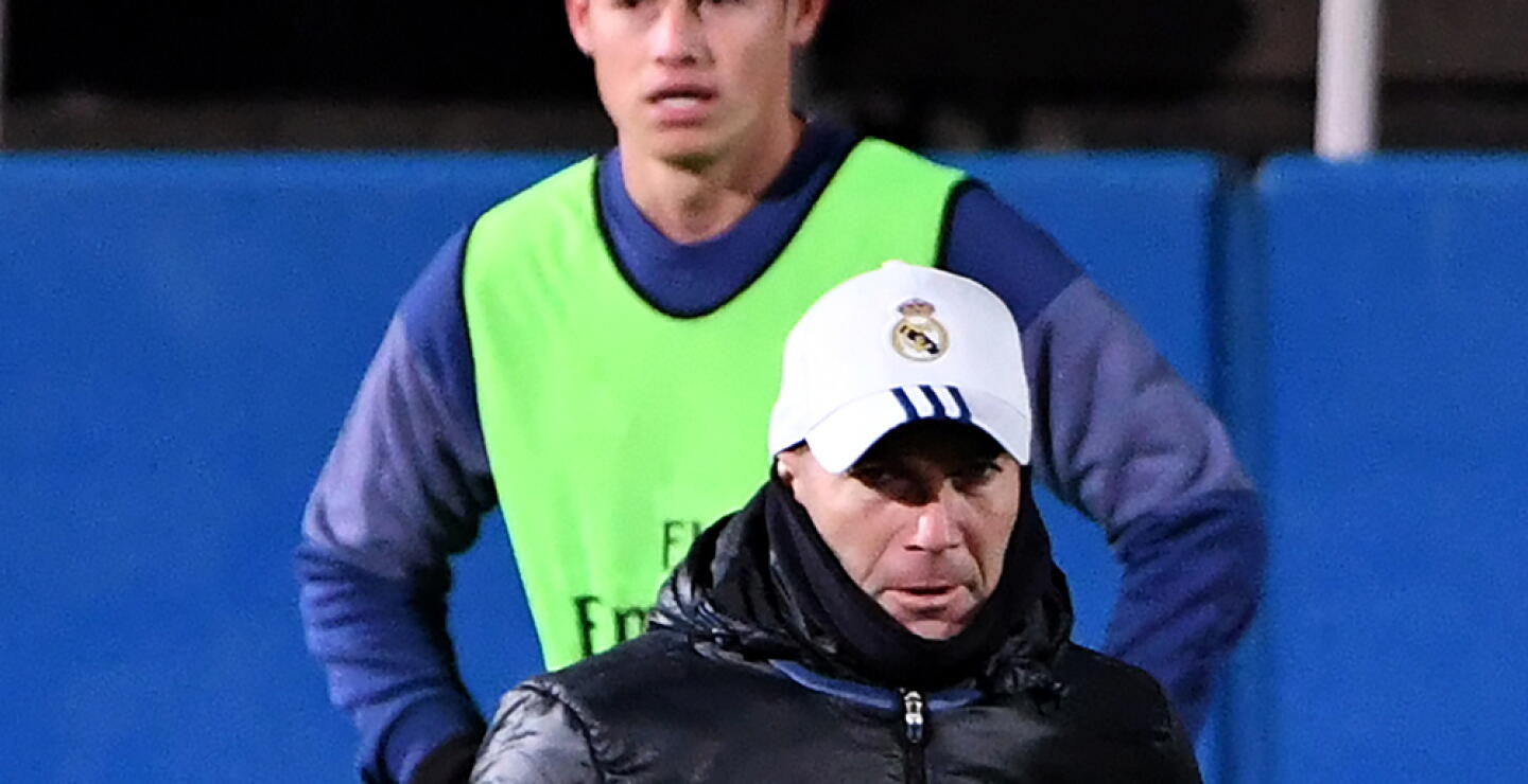 347934_James y Zidane - Foto AFP