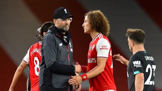 Jürgen Klopp y David Luiz Jürgen Klopp y David Luiz