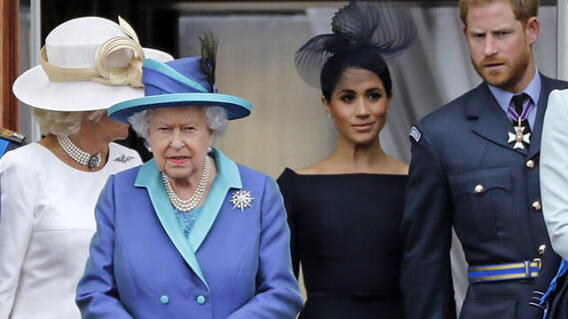 Reina Isabel, Meghan Markle y príncipe Harry / AFP.