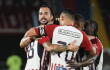 Jugadores de Junior y un festejo de gol. 
