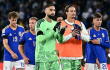 Jugadores de Italia tras su derrota contra Bélgica