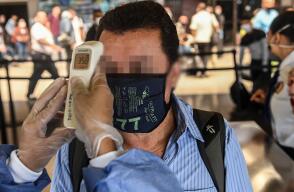 374047_Controles en terminales de transporte durante la pandemia // Foto: AFP, imagen de referencia