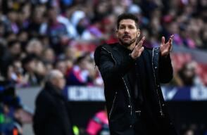 297536_simeone_140219_afp_e.jpg