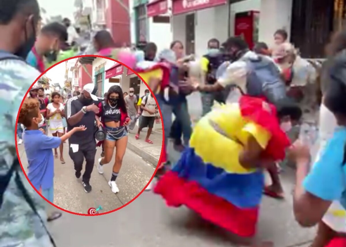 hombre que lanza dinero en cartagena.jpg