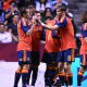Jugadores de España y un festejo de gol contra Perú en partido de preparación. 