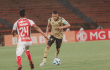 Kevin Castaño (der.), es el capitán de Águilas Doradas. Aquí en un juego contra Santa Fe.