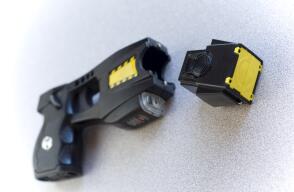 Black Taser with part unattached