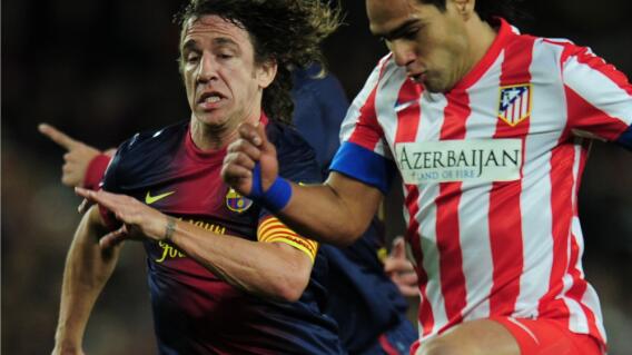364648_Carles Puyol y Radamel Falcao García // Foto: AFP