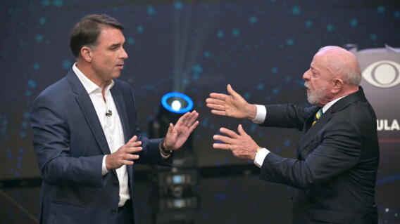 Flavio Bolsonaro y Lula da Silva.