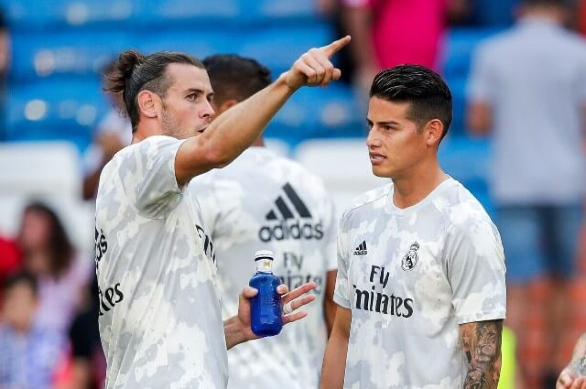 Futbolistas Gareth Bale y el colombiano James Rodríguez