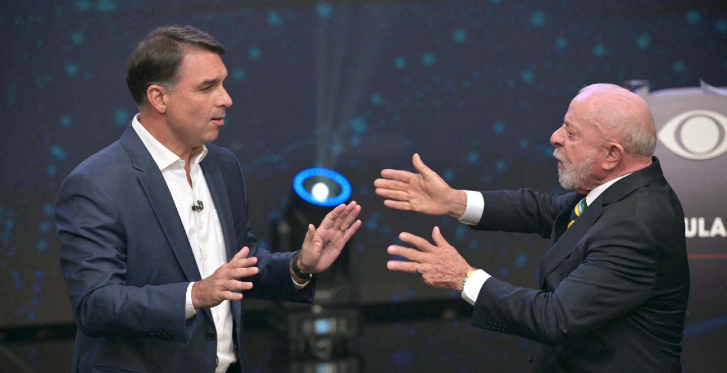 Flavio Bolsonaro y Lula da Silva.