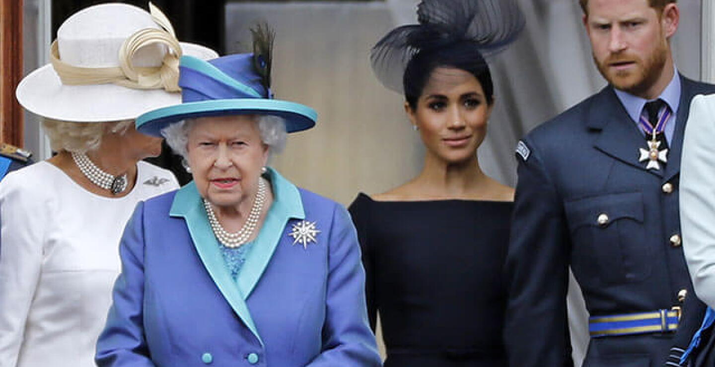 Reina Isabel, Meghan Markle y príncipe Harry / AFP.