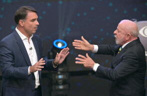 Flavio Bolsonaro y Lula da Silva.