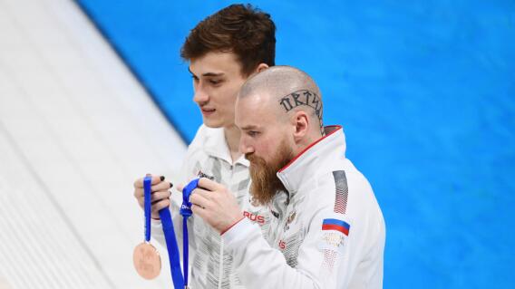 Imagen de referencia de unos deportistas rusos en medio de una competencia Imagen de referencia de unos deportistas rusos en medio de una competencia