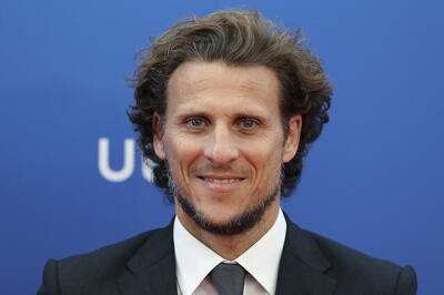 318415_diego_forlan_070819_afpe.jpg