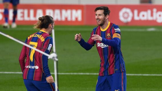 Griezmann y Messi / AFP Griezmann y Messi / AFP